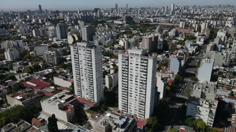 Aerial orbit shot over 2 big towers in South America Stock Footage 153786985