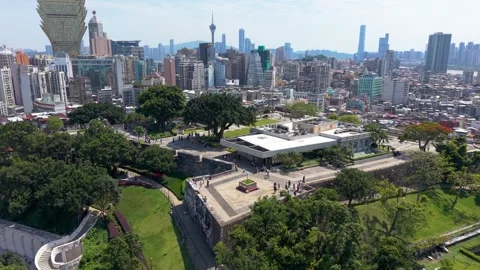 Aerial Orbit Shows Macau Museum Fortress Walls and Skyline with Macau Tower Stock Footage 340183329