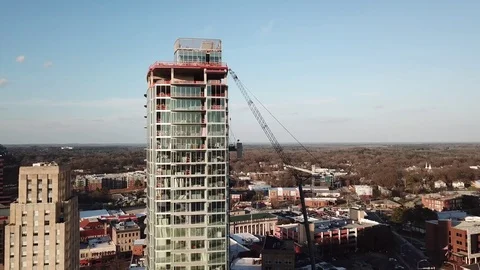 Aerial Orbit of Skyscraper Under Construction Stock Footage 120663884