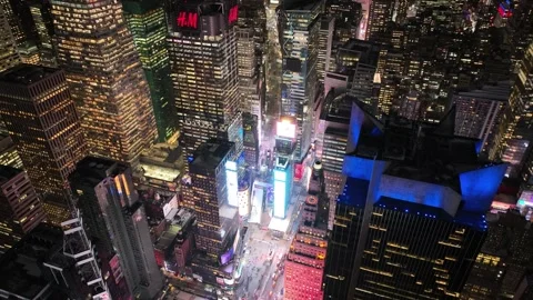 Aerial orbit tilt down over Times Square billboards at night Vídeo Stock 344596264
