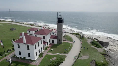 Aerial orbit video of Beavertail Lighthouse in Jamestown, Rhode Island Stock Footage 245883543