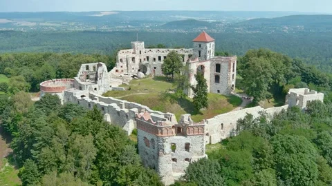 Aerial orbit view of huge ruins of Tenczyn Castle in Rudno, Polish Jura, Poland Stock-Footage 248477751