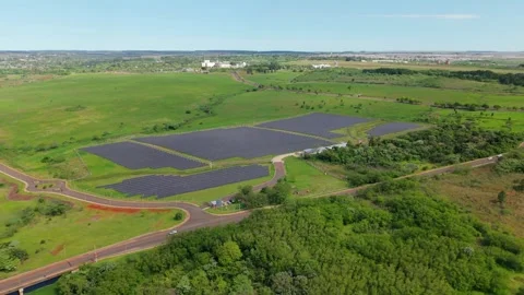 Aerial Orbit View of Large Solar Panel Array Farm in South American Countryside Vídeos de archivo 346255337