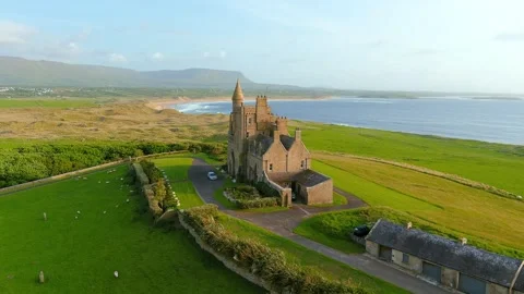 Aerial orbit view of Mullaghmore Head and Classiebawn Castle. Co Sligo, Ireland 스톡 동영상 253520691