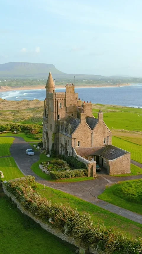 Aerial orbit view of Mullaghmore Head and Classiebawn Castle. Co Sligo, Ireland 스톡 동영상 292191923