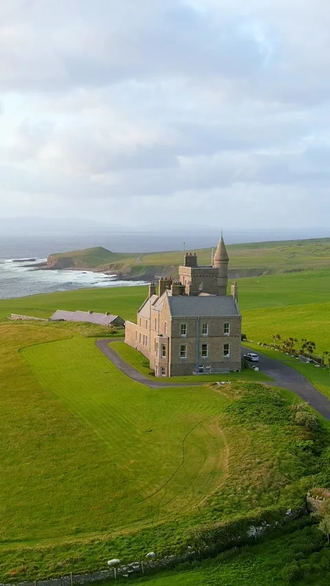 Aerial orbit view of Mullaghmore Head and Classiebawn Castle. Co Sligo, Ireland 스톡 동영상 293027478