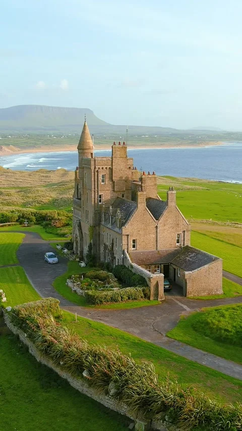 Aerial orbit view of Mullaghmore Head and Classiebawn Castle. Co Sligo, Ireland 스톡 동영상 302391349