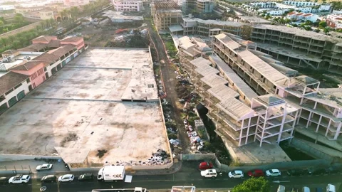 Aerial orbital view of the abandoned complex opposite Bahia Real Resort Stock Footage 223957607