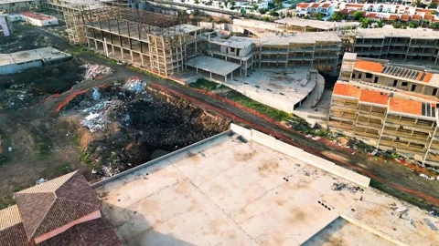 Aerial orbital view of the abandoned complex opposite Bahia Real Resort Stock Footage 223960233