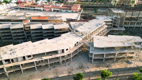 Aerial orbital view of the abandoned complex opposite Bahia Real Resort Stock Footage 224034410