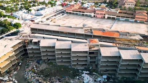 Aerial orbital view of the abandoned complex opposite Bahia Real Resort Stock Footage 224044387