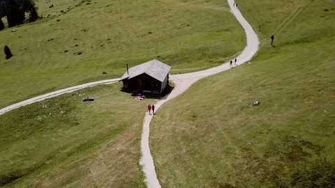 Aerial orbital view of trekkers on a path of Dolomites, Alps Stock Footage 114358297