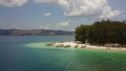 Aerial orbiting around island in paradise, Bali, Indonesia Stock Footage 129050341