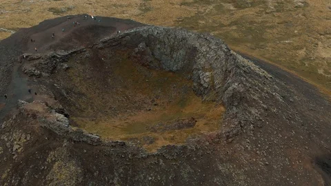 Aerial orbiting view around a volcanic crater in West Iceland Stock Footage 116182801