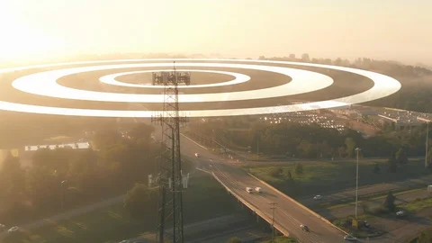 Aerial Orbiting View of Cell Tower at Sunrise Stock Footage 123792105