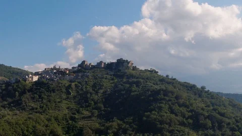 Aerial orbiting view of the hillltop town of Castiglione in Sicily Stock Footage 110802748