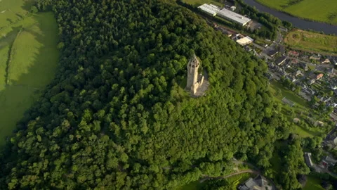Aerial orbiting view of the National Wallace Monument in Scotland Stock Footage 336776949