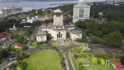 Aerial orbits Bukit Timbalan Sultan Ibrahim Building in Malaysia Stock Footage 237521480