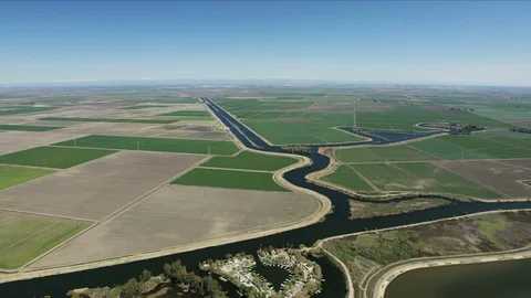 Aerial of organic patchwork crops fields Central Valley Stock-Footage 91544630