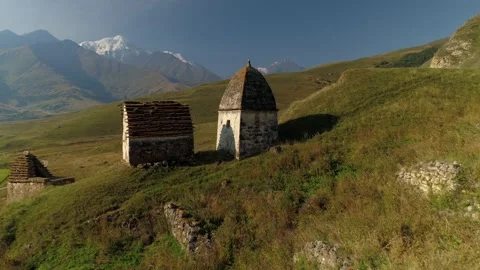 Aerial Ossetia alpine ancient crypt grave burial City of Dead Caucasus Dargavs   Stock Footage 150991806