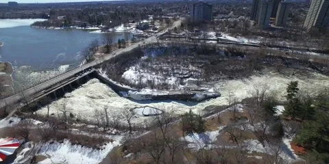 Aerial Ottawa hogsback falls and bridge with cars passing by Stock Footage 64067416