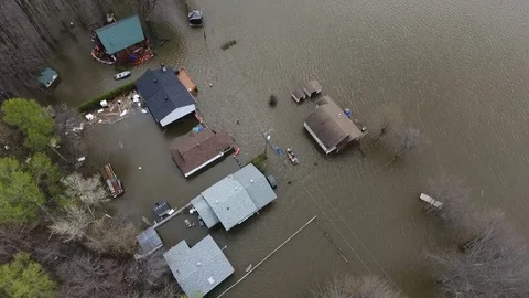 Aerial ottawa river flood emergency crews in boat and kayak rotating view 4k Stock Footage