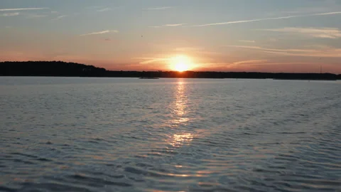 Aerial over the Bay During Sunset Stock Footage 136024109