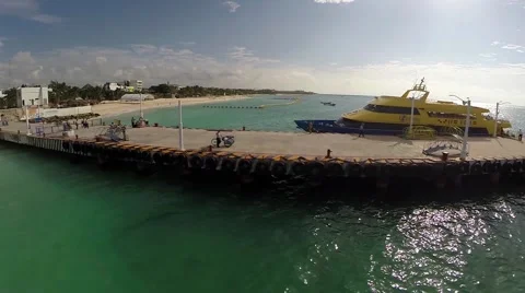 Aerial over a boat docking on the beach Stock Footage 46908669