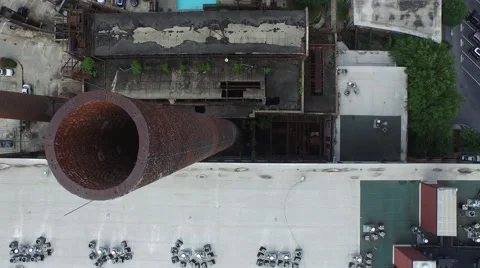 Aerial over a brick smoke stack Stock Footage 50649443