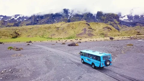Aerial over a bus driving near Stock Video Pond5
