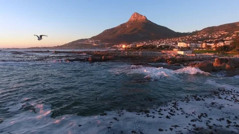 Aerial over Camps Bay in Cape Town, South Africa Stock Footage