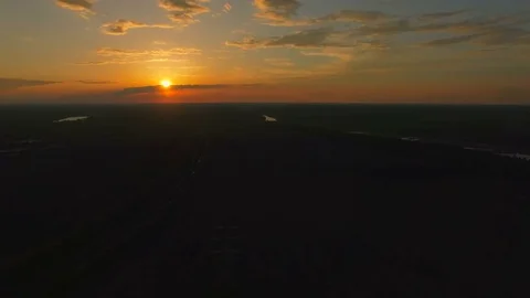 Aerial over clouds during beautiful sunset Stock Footage 74830027