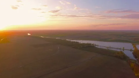 Aerial over clouds during beautiful sunset Stock Footage 74831554