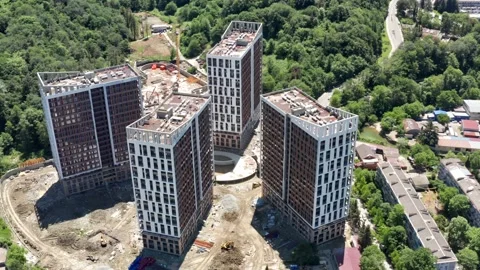 Aerial over the construction site. work as construction, builders work 動画素材 155042292