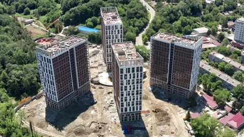 Aerial over the construction site. work as construction, builders work 動画素材 155042326