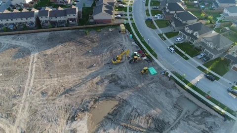Aerial Over Empty Plots Of Land For New Real Estate Development By Upscale H Stock Footage 254422344