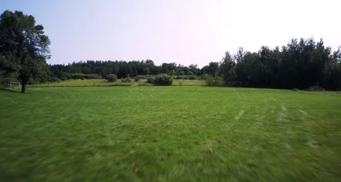 Aerial over field of grass Stock Footage 54712236