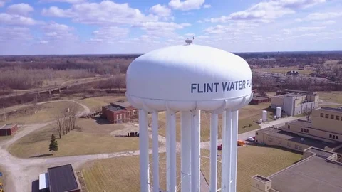 Aerial over the Flint Michigan water tanks during the infamous Flint water Stock Footage