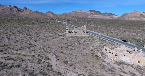 Aerial over ghost town building ruins, Rhyolite, Nevada near Death Valley Video stock 72960103