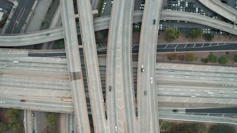 Aerial over highway and intersection of roads, bridges in downtown Los Angeles Stock-Footage 135491881