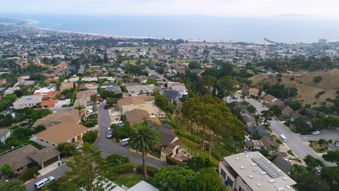 Aerial over a hillside neighborhood in Los Angeles or Ventura County California. Stock Footage