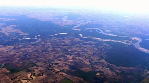 Aerial over Mississippi RIver and farmland, 4K Stock Footage