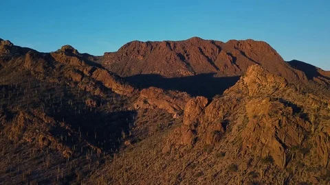 Aerial over mountain covered with cacti in Saguaro National Park, Tucson, AZ Stock Footage 101816941