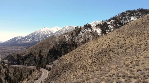 Aerial over Mountain Highway in Winter (4k) Stock Footage 87635654