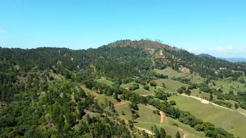 Aerial over mountain range covered with dense green forest near Jarabacoa Stock Footage 202294067