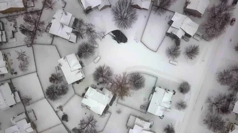 Aerial Over Neighbourhood in Snowy Conditions  Stock Footage
