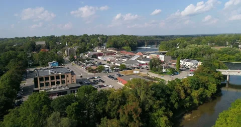 Aerial Over Nice Small Town Valley, Buildings and Streets Next To The River Stock Footage 200824374