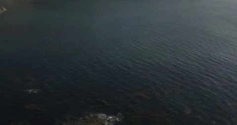 Aerial over ocean and cliffs, foggy day Stock Footage 105962217