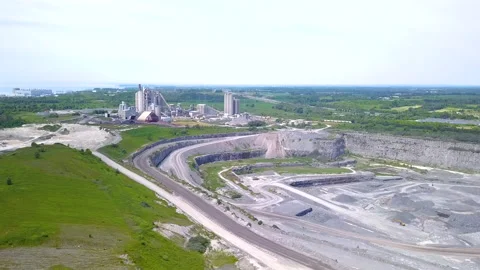 Aerial over a quarry pit at an aggregates mining operation Stock Footage 135484993