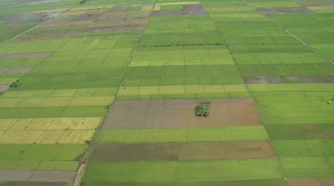 Aerial over rural fields with a river going right through Stock Footage 641159